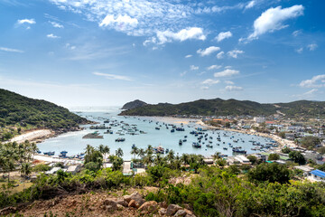 The beautiful panoramic landscape of Vietnam beach, Vinh Hy bay, Ninh Thuan, with group of boats are anchoring at fishing village