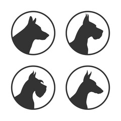 Fototapeta premium Four breeds dogs icon set. Dogs graphic signs in the circle isolated on white background. Dog breeding symbols. Vector illustration