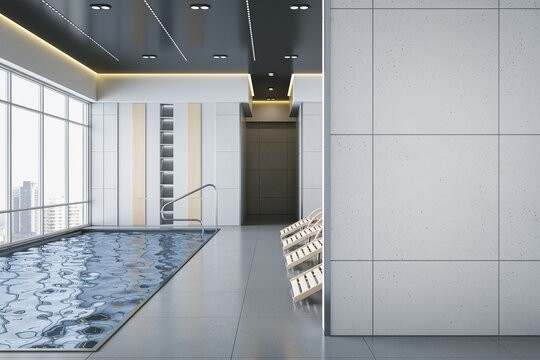 Modern luxury gym interior with swimming pool, empty mock up place on wall and panoramic windows with city view and daylight. Healthy lifestyle and interiors concept. 3D Rendering.