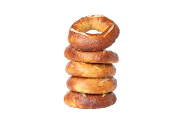Fototapeta na wymiar Concept of tasty bakery - bagels, isolated on white background
