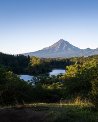 Fototapeta premium Morning view of Mt Taranaki from Lake Mangamahoe, New Plymouth. Vertical format.
