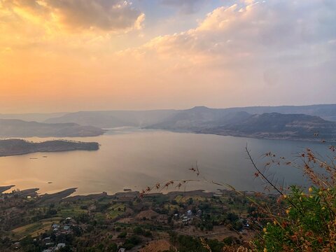 Beautiful view of the sunset and mountains from Sajjangad, satara, Maharashtra, India. Koyana dam backwater view from sajjangad. 