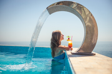 Woman relaxing at the pool