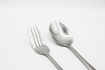 spoon and fork on white background