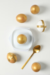 Obraz na płótnie Canvas Concept of Richness, golden eggs, top view