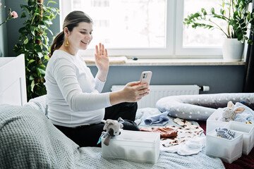 How To Start A Pregnancy Baby Blog for parents-to-be and make money from home. Pregnant woman blogger recording video for her blog social media.