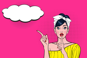 Surprised sexy woman with open mouth and pointing to speech bubble