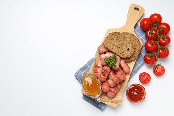 Concept of tasty food, grilled mini sausage, space for text