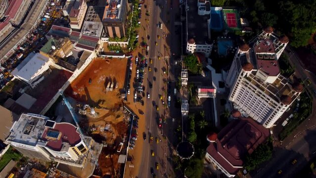 Aerial, traffic driving on a main street in downtown Yaounde, capital of Cameroon