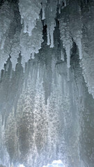 large icicles in an ice cave on Lake Baikal, Siberia, Russia.