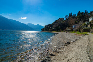 The town of Pianello del lario, on Lake Como, and the path along the lake.
