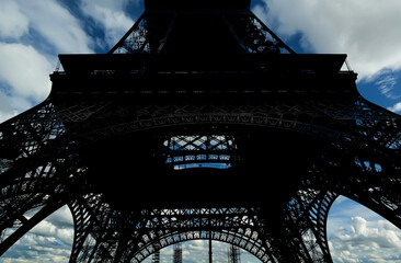 Eiffel Tower against the background of a beautiful sky with clouds. Paris, France