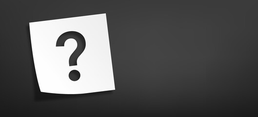 メモ用紙に切り抜かれたクエスチョンマーク