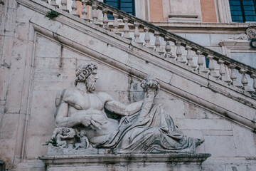 Ancient scultpure in city of Rome, Italy