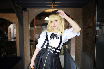 Portrait of a beautiful young woman game Cosplay with blonde hair