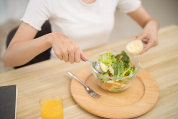Asian woman dieting Weight loss eating fresh fresh homemade salad healthy eating concept