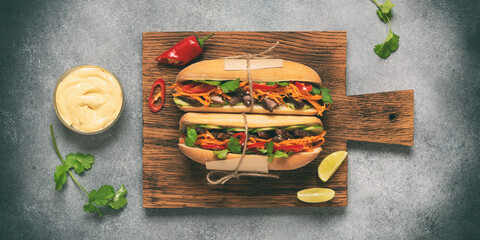 Banh mi, vietnamese sandwich. Top view, flat lay, banner, selective focus. Toned photo