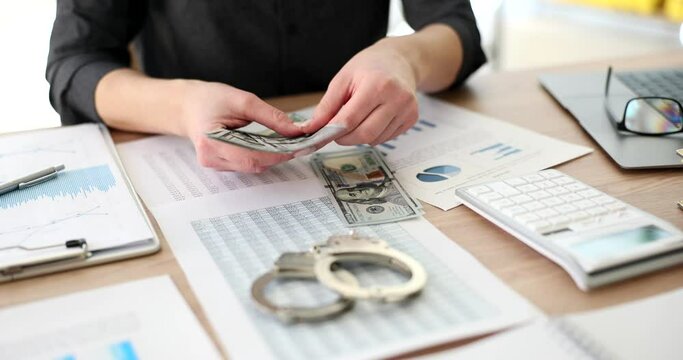 Seo or manager counts cash in workplace concept