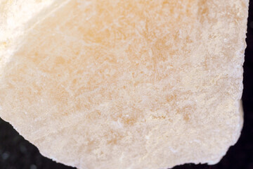 Red Gypsum stone mineral, close-up, macro. Selective focus