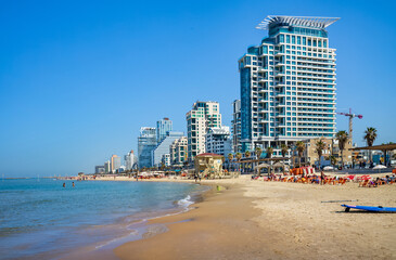  Tel Aviv beach with a view of Mediterranean sea and sea front hotels, Israel.