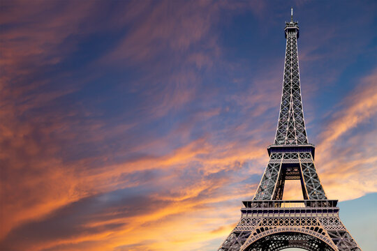  Eiffel Tower against the background of a beautiful sky at sunset. Paris, France