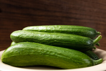 Small, elongated fresh snack cucumbers