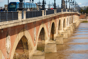 Famous bridge of Pont de Pierre. Garone river. Bordeaux, France