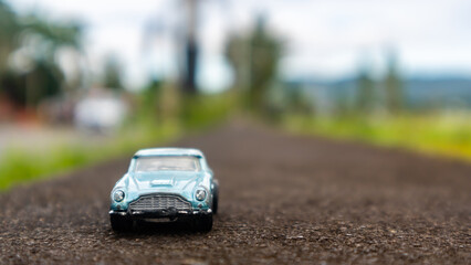 minahasa, Indonesia : January 2023, toy car in the rice field