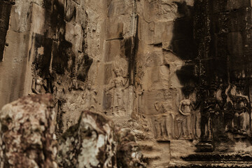 ancient frescoes and bas-reliefs of the angkor watt temple complex