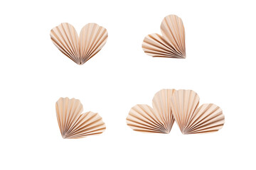 Paper accordion hearts in beige color on a transparent background. An element of your collage, a work of art.