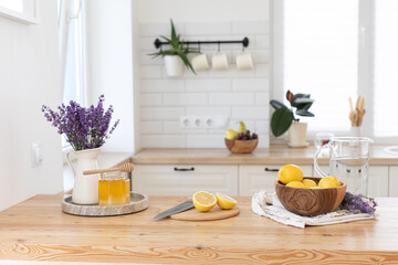 Making a refreshing summer drink. Preparing lemonade in the kitchen. Healthy food concept