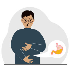 The concept of pain in the abdomen. The man holds his stomach with both hands. Problems with the stomach or digestion.
