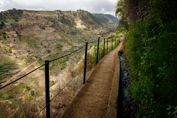 Fototapeta na wymiar Levada on Madeira - irrigation canal and tourist trail