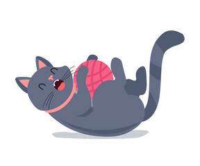 Cute cat playing with ball of wool thread, lying gray kitten with funny amusing face