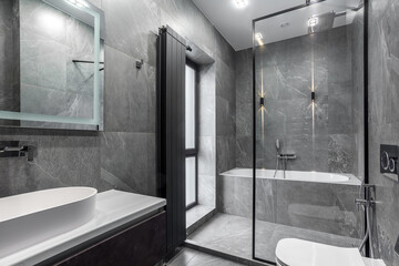 Modern furnished bathroom dark grey interior design with granite tiles - obrazy, fototapety, plakaty