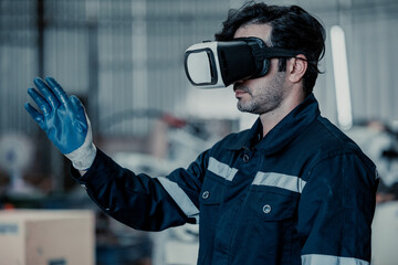 Virtual reality goggles are worn by robotics specialists to facilitate remote support, robotic...