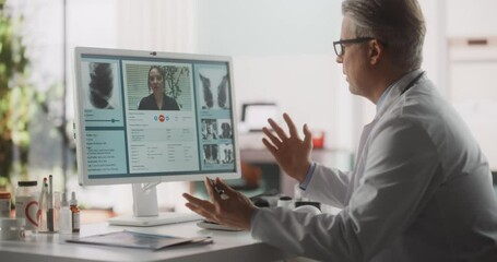 Doctor's Online Medical Consultation: Caucasian Middle Aged Physician Making a Conference Video Call with a Patient on a Computer. Health Care Professional Giving Advice, Explaining Treatment - Powered by Adobe