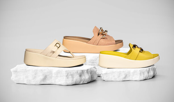 Creative Photo of Beautiful Sandels for girls in podium platform mockup psd modern shoe design, Seamless background