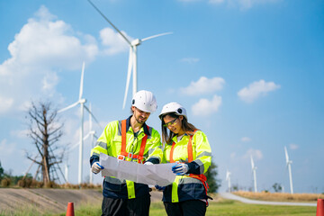 Wind turbine service engineer maintenance and plan for inspection at construction site, renewable...