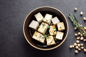 Bowl of marinated Tofu with soy sauce created with Generative AI technology
