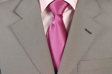 Man in suit. Close up of classic business attire with tie and elegant blazer.