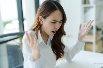Businesswoman expressing frustration.