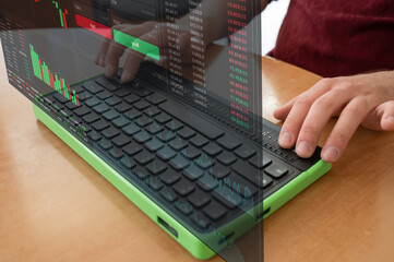 The blind person uses a computer with a Braille display and a computer keyboard. HUD menu. Stock...
