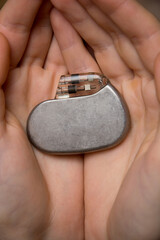 medical pacemaker hold in hand
