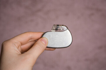medical pacemaker hold in hand