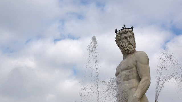 Fountain of Neptune in Piazza della Signoria, main square in Florence, Italy. Historic tourist attraction of Tuscany, Italy.