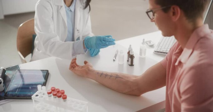 Female Healthcare Professional at Work in Hospital Office. Doctor Applying Different Solutions with Food Allergens on Patient's Forearm. Immunologist Diagnosing any Immediate Allergic Skin Reactions