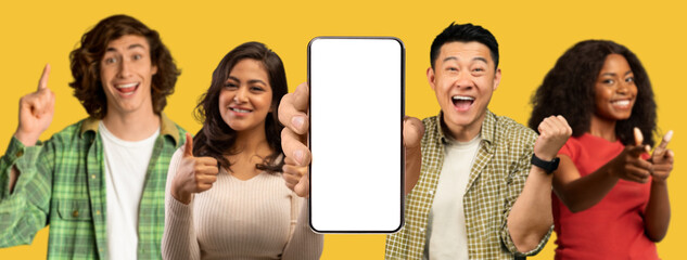 Satisfied shocked diverse people show smartphone with blank screen make victory and success gesture with hand