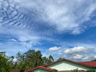 Full frame cloudy Blue sky view at day in a village.