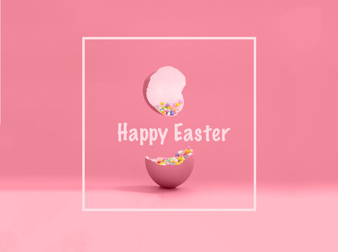 Broken decorative easter egg with colorful confetti. Minimal composition, vivid color pastel pink background. Copy space. Text Happy Easter.